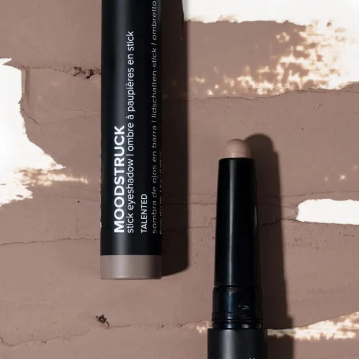 Younique MOODSTRUCK eyeshadow stick in Talented, a matte rosy taupe shade: stick and colour swatch